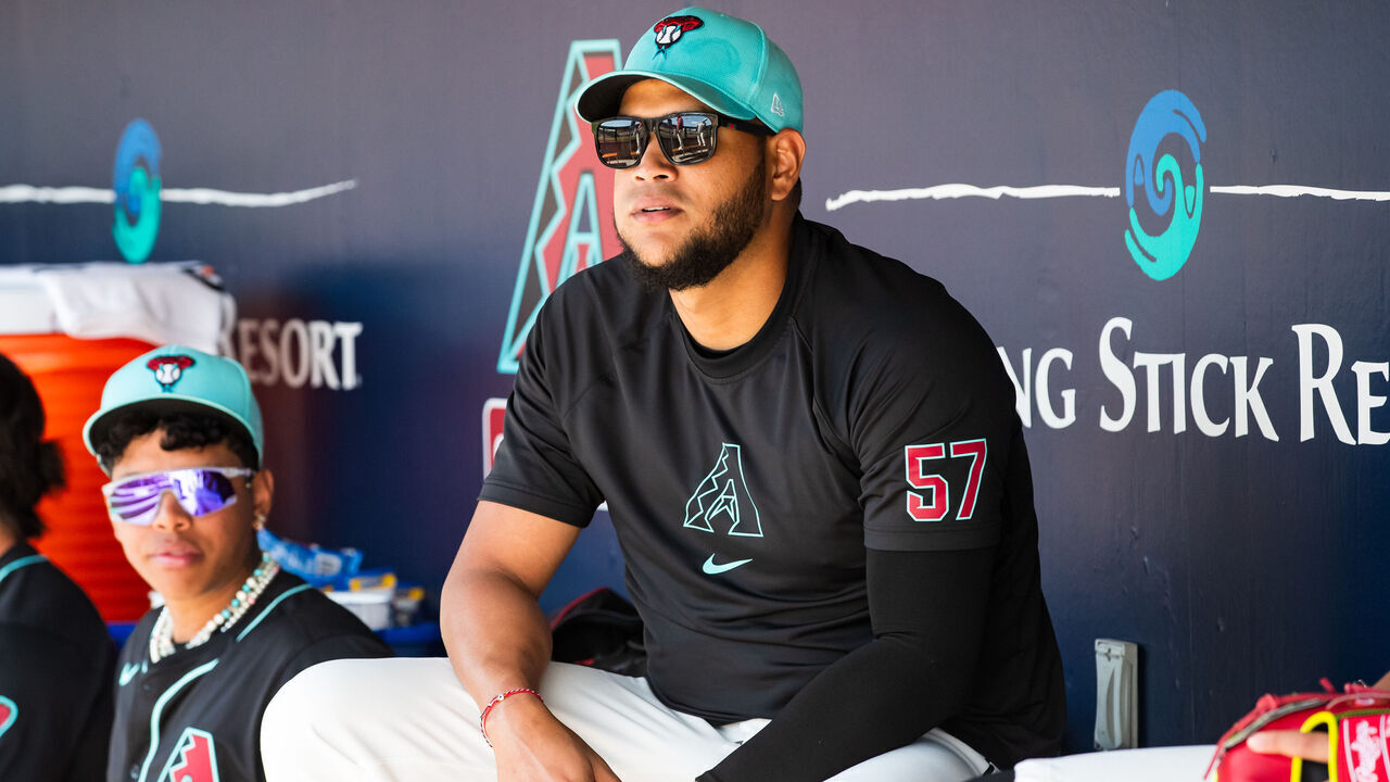 SCOTTSDALE, ARIZONA - MARCH 13: Eduardo Rodriguez #57 of the Arizona Diamondbacks sits in the dugout during the Spring Training game against the Colorado Rockies at Salt River Fields at Talking Stick on March 13, 2024 in Scottsdale, Arizona.
