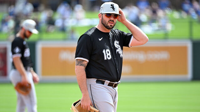 GLENDALE, ARIZONA - FEBRUARY 27, 2024: Mike Moustakas #18 of the Chicago White Sox looks on during the second inning of a spring training game against the Los Angeles Dodgers at Camelback Ranch on February 27, 2024 in Glendale, Arizona.