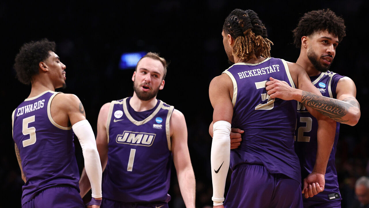 NEW YORK, NEW YORK - MARCH 22: Terrence Edwards Jr. #5 of the James Madison Dukes celebrates with teammates after defeating the Wisconsin Badgers 72-61 in the first round of the NCAA Men's Basketball Tournament at Barclays Center on March 22, 2024 in New York City.