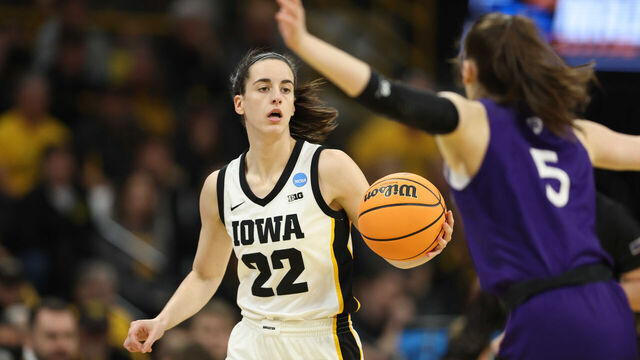 IOWA CITY, IOWA - MARCH 23: Caitlin Clark #22 of the Iowa Hawkeyes dribbles the ball against the Holy Cross Crusaders during the first round of the 2024 NCAA Women's Basketball Tournament held at Carver-Hawkeye Arena on March 23, 2024 in Iowa City, Iowa.