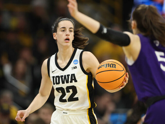 IOWA CITY, IOWA - MARCH 23: Caitlin Clark #22 of the Iowa Hawkeyes dribbles the ball against the Holy Cross Crusaders during the first round of the 2024 NCAA Women's Basketball Tournament held at Carver-Hawkeye Arena on March 23, 2024 in Iowa City, Iowa.