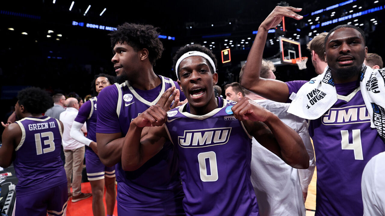 NEW YORK, NEW YORK - MARCH 22: Xavier Brown #0 of the James Madison Dukes celebrates after defeating the Wisconsin Badgers during the first round of the 2024 NCAA Men's Basketball Tournament held at Barclays Center on March 22, 2024 in New York City.