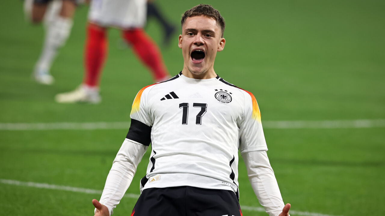 LYON, FRANCE - MARCH 23: Florian Wirtz of Germany celebrates as he scores the goal 0:1 during the international friendly match between France and Germany at Groupama Stadium on March 23, 2024 in Lyon, France.