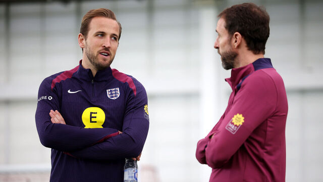 BURTON UPON TRENT, ENGLAND - MARCH 20: Harry Kane of England talks to Gareth Southgate, Manager of England men's senior team, during a training session at St George's Park on March 20, 2024 in Burton upon Trent, England.