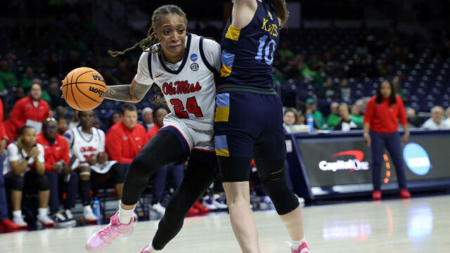 SOUTH BEND, INDIANA - MARCH 23: Madison Scott #24 of the Ole Miss Rebels pushes to get past Claire Kaifes #10 of the Marquette Golden Eagles during the first round of the 2024 NCAA Women's Basketball Tournament held at Purcell Pavilion on March 23, 2024 in South Bend, Indiana.