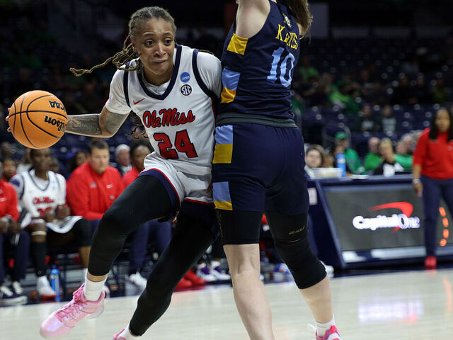 SOUTH BEND, INDIANA - MARCH 23: Madison Scott #24 of the Ole Miss Rebels pushes to get past Claire Kaifes #10 of the Marquette Golden Eagles during the first round of the 2024 NCAA Women's Basketball Tournament held at Purcell Pavilion on March 23, 2024 in South Bend, Indiana.