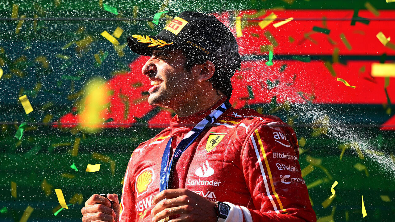 MELBOURNE, AUSTRALIA - MARCH 24: Race winner Carlos Sainz of Spain and Ferrari celebrates on the podium during the F1 Grand Prix of Australia at Albert Park Circuit on March 24, 2024 in Melbourne, Australia.