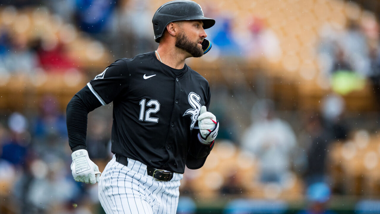 GLENDALE, ARIZONA - MARCH 15: Kevin Pillar #12 of the Chicago White Sox runs to first base during the Spring Training game against the Chicago Cubs at Camelback Ranch on March 15, 2024 in Glendale, Arizona.