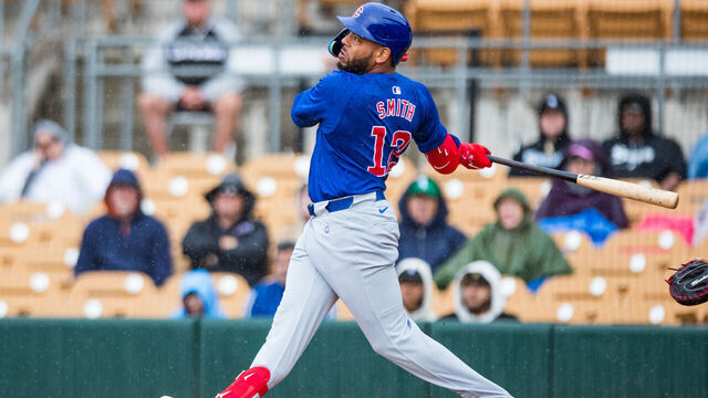 GLENDALE, ARIZONA - MARCH 15: Dominic Smith #12 of the Chicago Cubs hits the ball during the Spring Training game against the Chicago White Sox at Camelback Ranch on March 15, 2024 in Glendale, Arizona.