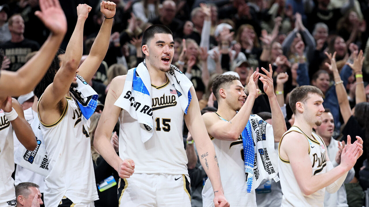 INDIANAPOLIS, INDIANA - MARCH 24: Zach Edey #15 of the Purdue Boilermakers celebrates a basket from the bench against the Utah State Aggies during the second half in the second round of the NCAA Men's Basketball Tournament at Gainbridge Fieldhouse on March 24, 2024 in Indianapolis, Indiana.