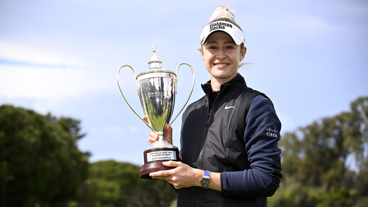PALOS VERDES ESTATES, CALIFORNIA - MARCH 24: Nelly Korda of the United States celebrates with the trophy after winning the FIR HILLS SERI PAK Championship at Palos Verdes Golf Club on March 24, 2024 in Palos Verdes Estates, California.