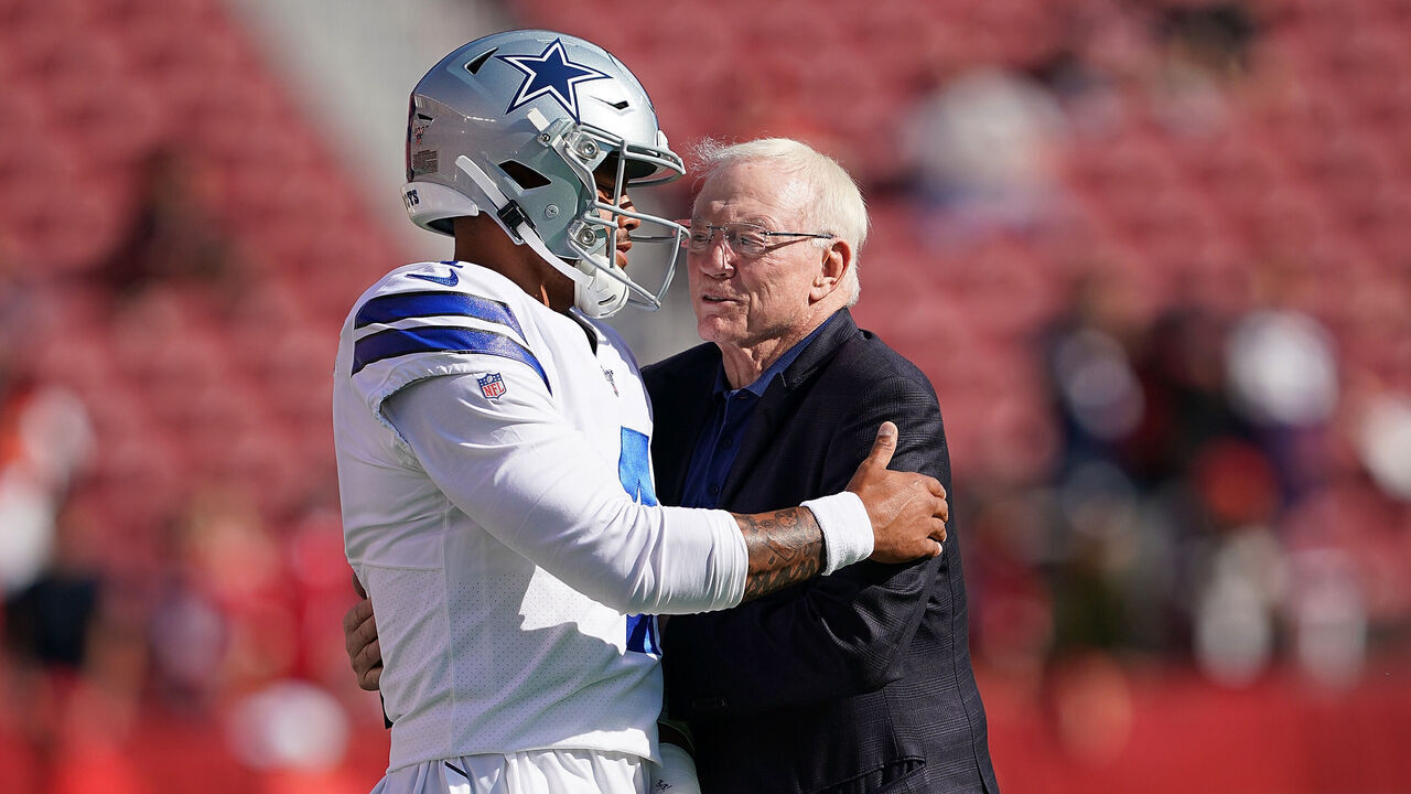 SANTA CLARA, CA - AUGUST 10: Quarterback Dak Prescott #4 and team owner Jerry Jones of the Dallas Cowboys hug each other during pregame warm ups prior to the start of an NFL preseason football game against the San Francisco 49ers at Levi's Stadium on August 10, 2019 in Santa Clara, California.