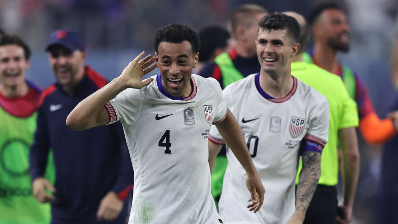 ARLINGTON, TEXAS - MARCH 24: Tyler Adams #4 of United States celebrates after scoring the team's first goal during Final - Concacaf Nations League match between Mexico and United States at AT&T Stadium on March 24, 2024 in Arlington, Texas.