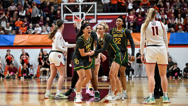 BLACKSBURG, VIRGINIA - MARCH 24: Jada Walker #11 of the Baylor Lady Bears celebrates with teammates after hitting a long range shot at the end of the third quarter of a game against the Virginia Tech Hokies during the second round of the 2024 NCAA Women's Basketball Tournament held at Cassell Coliseum on March 24, 2024 in Blacksburg, Virginia.