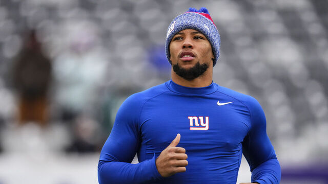 EAST RUTHERFORD, NJ - JANUARY 07: Saquon Barkley #26 of the New York Giants warms up prior to an NFL football game against the Philadelphia Eagles at MetLife Stadium on January 7, 2024 in East Rutherford, New Jersey.