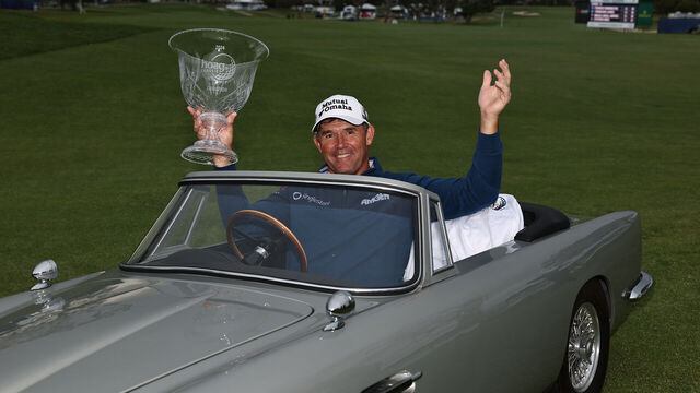 NEWPORT BEACH, CALIFORNIA - MARCH 24: Padraig Harrington of Ireland poses for a photo with the winners trophy in a miniature Aston Martin during the final round of the Hoag Classic Newport Beach at Newport Beach Country Club on March 24, 2024 in Newport Beach, California.