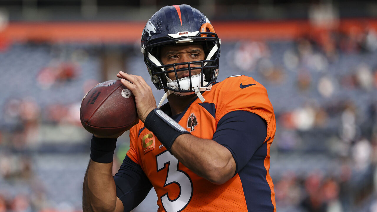 DENVER, CO - DECEMBER 31: Russell Wilson #3 of the Denver Broncos warms up prior to an NFL football game against the Los Angeles Chargers at Empower Field at Mile High on December 31, 2023 in Denver, Colorado.