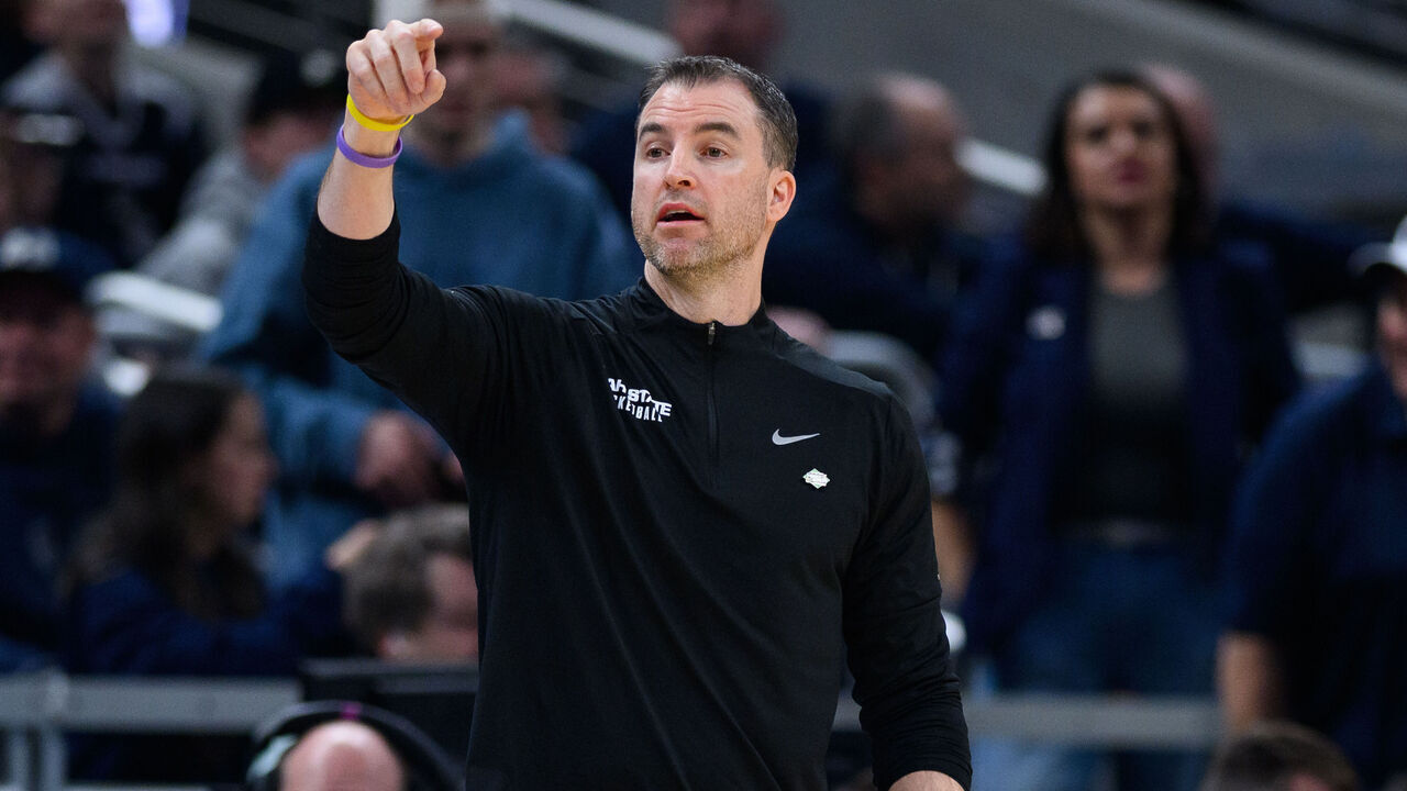 INDIANAPOLIS, IN - MARCH 22: Utah State Aggies head coach Danny Sprinkle on the sidelines during the TCU Horned Frogs versus the Utah State Aggies in the first round of the NCAA Division 1 Championship on March 22, 2024, at Gainbridge Fieldhouse in Indianapolis, IN.
