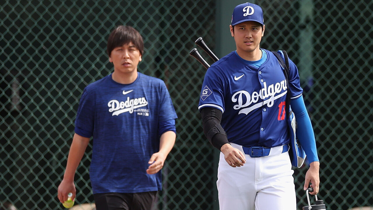 GLENDALE, ARIZONA - FEBRUARY 27: Shohei Ohtani #17 of the Los Angeles Dodgers and interpreter Ippei Mizuhara arrive to a game against the Chicago White Sox at Camelback Ranch on February 27, 2024 in Glendale, Arizona.