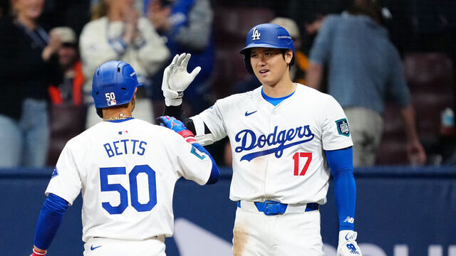 SEOUL, SOUTH KOREA - MARCH 21: Jason Heyward #23 and Shohei Ohtani #17 greet Mookie Betts #50 of the Los Angeles Dodgers after his two-run home run in the fifth inning of the 2024 Seoul Series game between the San Diego Padres and the Los Angeles Dodgers at Gocheok Sky Dome on Thursday, March 21, 2024 in Seoul, California.