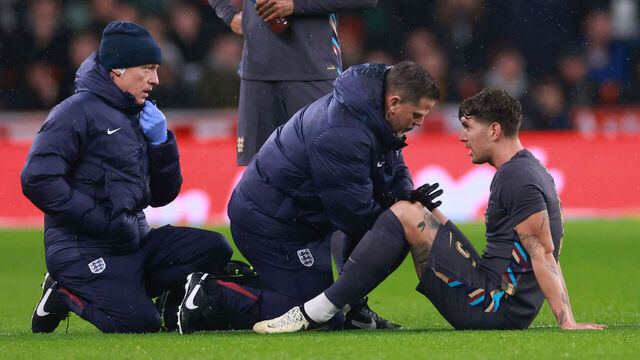 LONDON, ENGLAND - MARCH 26: John Stones of England is treated before being forced of with an injury during the international friendly match between England and Belgium at Wembley Stadium on March 26, 2024 in London, England.