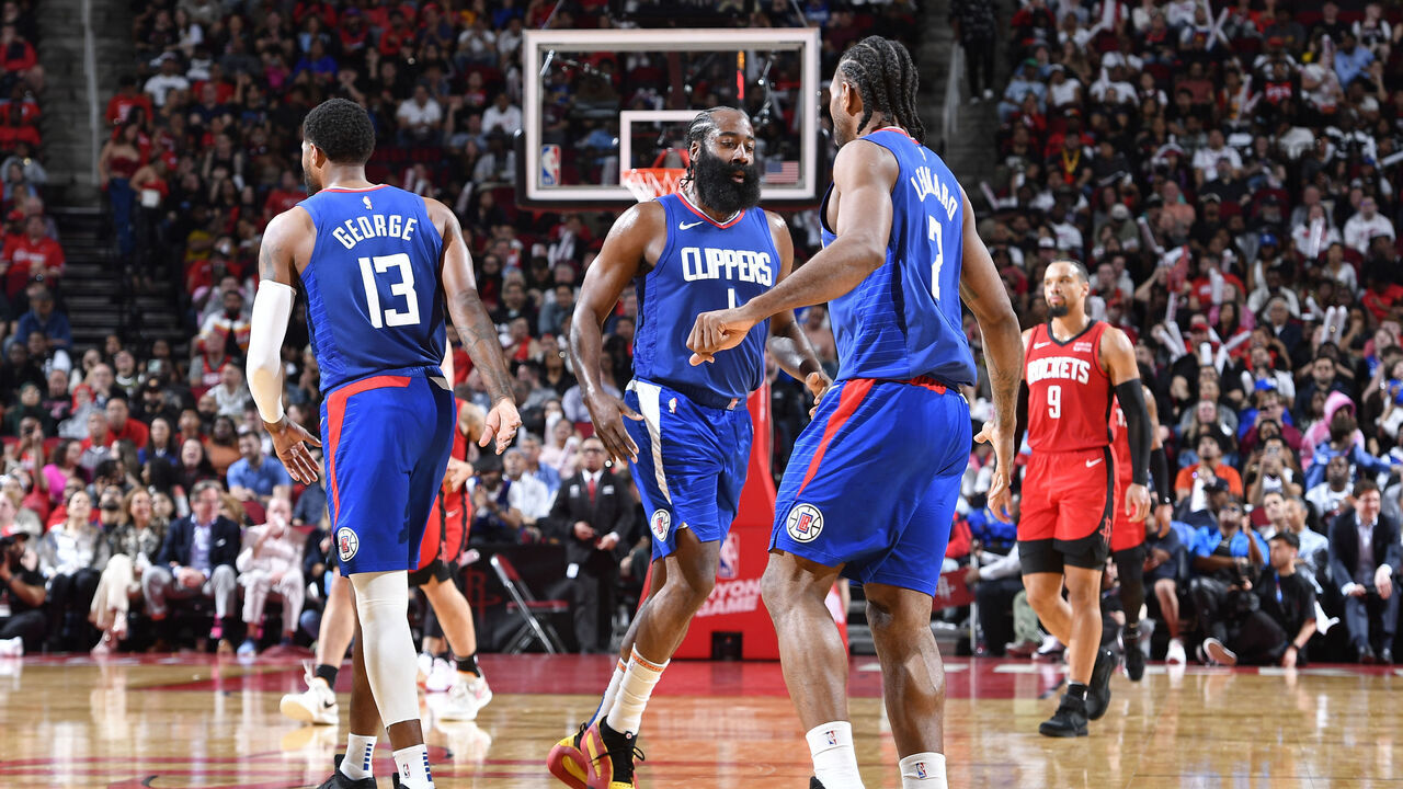 HOUSTON, TX - MARCH 6: James Harden #1 and Kawhi Leonard #2 of the LA Clippers high five during the game against the Houston Rockets on March 6, 2024 at the Toyota Center in Houston, Texas. Mandatory Copyright Notice: Copyright 2024 NBAE