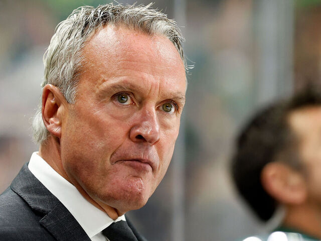 ST PAUL, MINNESOTA - OCTOBER 24: Head coach Dean Evason of the Minnesota Wild looks on against the Edmonton Oilers in the third period at Xcel Energy Center on October 24, 2023 in St Paul, Minnesota. The Wild defeated the Oilers 7-4.