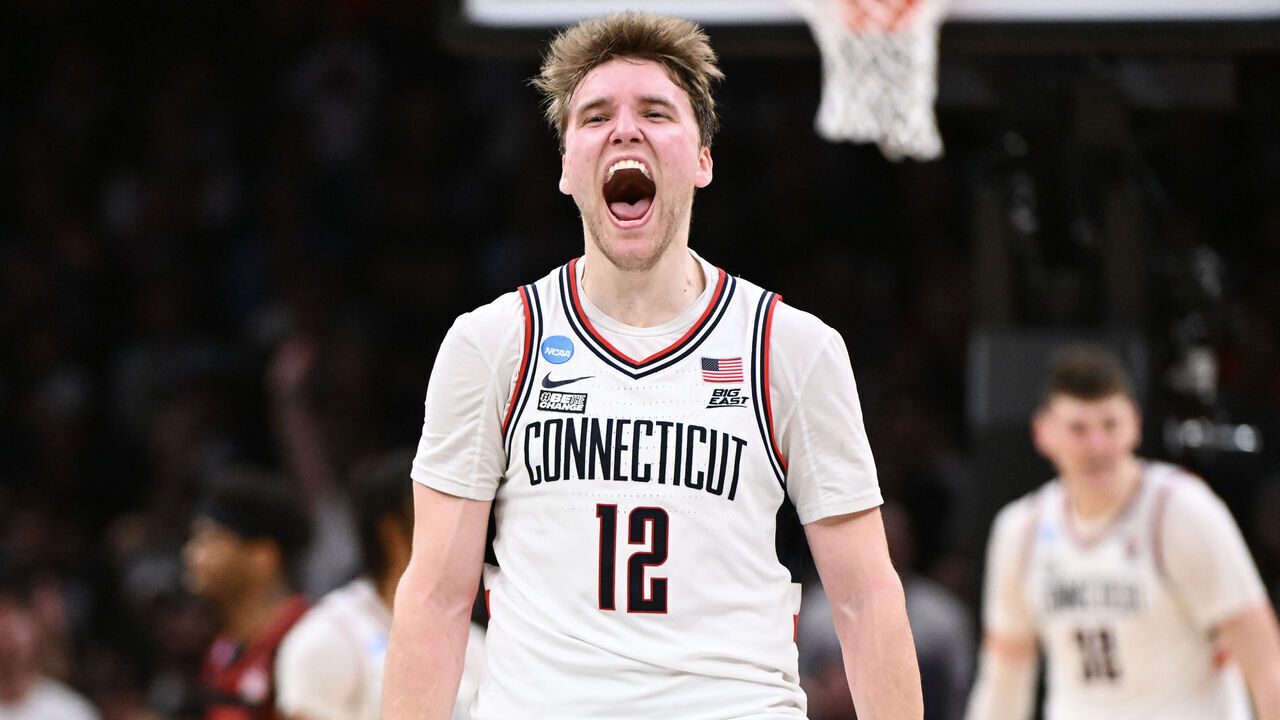 BOSTON, MASSACHUSETTS - MARCH 28: Cam Spencer #12 of the Connecticut Huskies celebrates a point against the San Diego State Aztecs during the second half of the NCAA Tournament held at TD Garden on March 28, 2024 in Boston, Massachusetts.