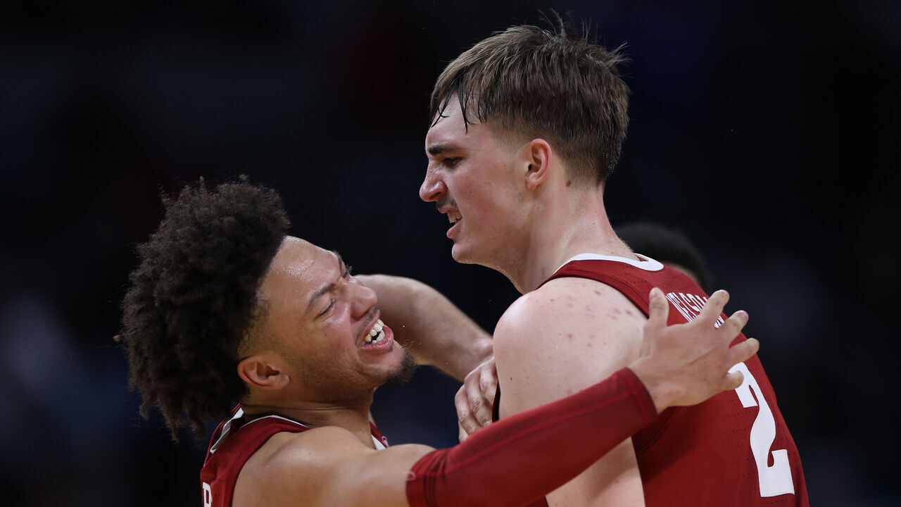 LOS ANGELES, CALIFORNIA - MARCH 28: Grant Nelson #2 of the Alabama Crimson Tide celebrates with his teammate Mark Sears #1 after scoring against the North Carolina Tar Heels during the second half in the Sweet 16 round of the NCAA Men's Basketball Tournament at Crypto.com Arena on March 28, 2024 in Los Angeles, California.