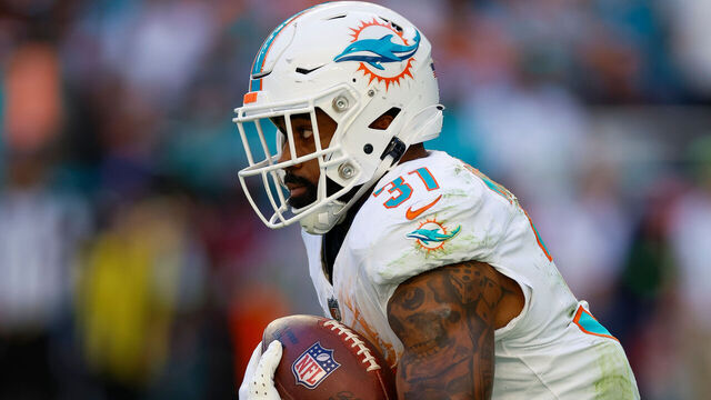 MIAMI GARDENS, FLORIDA - DECEMBER 17: Raheem Mostert #31 of the Miami Dolphins runs with the ball in the first half during a game against the New York Jets at Hard Rock Stadium on December 17, 2023 in Miami Gardens, Florida.