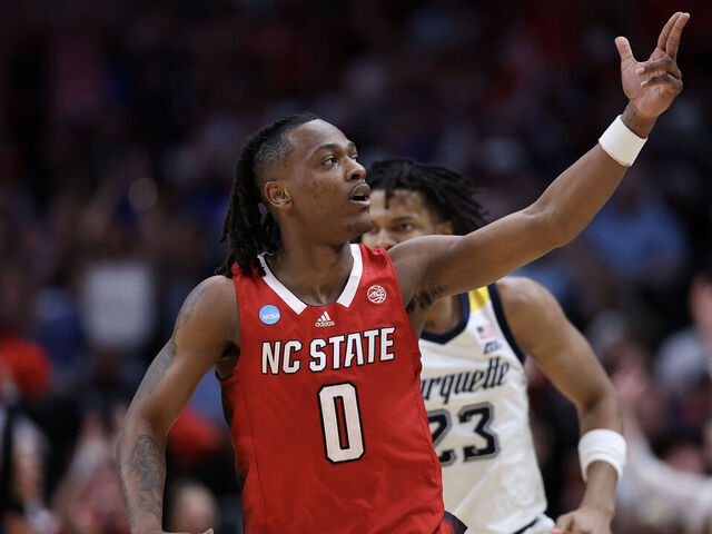 DALLAS, TEXAS - MARCH 29: DJ Horne #0 of the North Carolina State Wolfpack reacts against the Marquette Golden Eagles during the second half in the Sweet 16 round of the NCAA Men's Basketball Tournament at American Airlines Center on March 29, 2024 in Dallas, Texas.