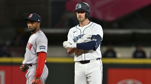 SEATTLE, WASHINGTON - MARCH 28: Mitch Garver #18 of the Seattle Mariners gestures after hitting a double during the eighth inning of the Opening Day game against the Boston Red Sox at T-Mobile Park on March 28, 2024 in Seattle, Washington.