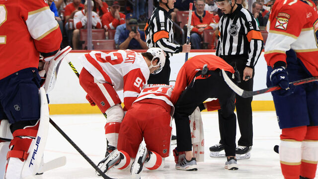 SUNRISE, FLORIDA - MARCH 30: Dylan Larkin #71 of the Detroit Red Wings is injured during the first period against the Florida Panthers at Amerant Bank Arena on March 30, 2024 in Sunrise, Florida.