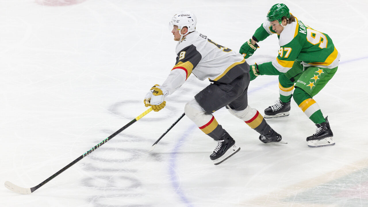 SAINT PAUL, MN - MARCH 30: Vegas Golden Knights center Jack Eichel (9) skates with the puck while being defended by Minnesota Wild left wing Kirill Kaprizov (97) during the first period of the NHL game between the Vegas Golden Knights and the Minnesota Wild on March 30th, 2024, at the Xcel Energy Center in Saint Paul, MN.