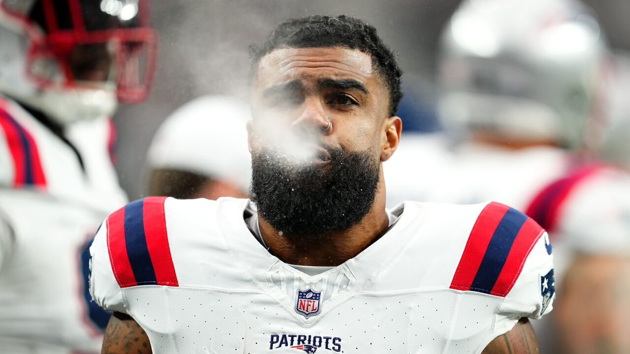 LAS VEGAS, NEVADA - OCTOBER 15: Ezekiel Elliott #15 of the New England Patriots spits out water prior to a game against the Las Vegas Raiders at Allegiant Stadium on October 15, 2023 in Las Vegas, Nevada.