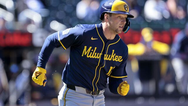 NEW YORK, NEW YORK - MARCH 30: Rhys Hoskins #12 of the Milwaukee Brewers runs up the first base line after connecting for a two run RBI single in the top of the first inning against the New York Mets at Citi Field on March 30, 2024 in New York City.