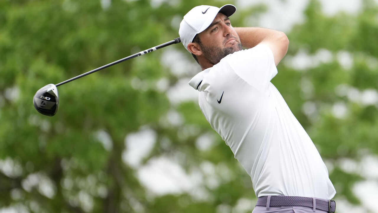 HOUSTON, TEXAS - MARCH 30: Scottie Scheffler of the United States hits a tee shot on the 12th hole during the third round of the Texas Children's Houston Open at Memorial Park Golf Course on March 30, 2024 in Houston, Texas.