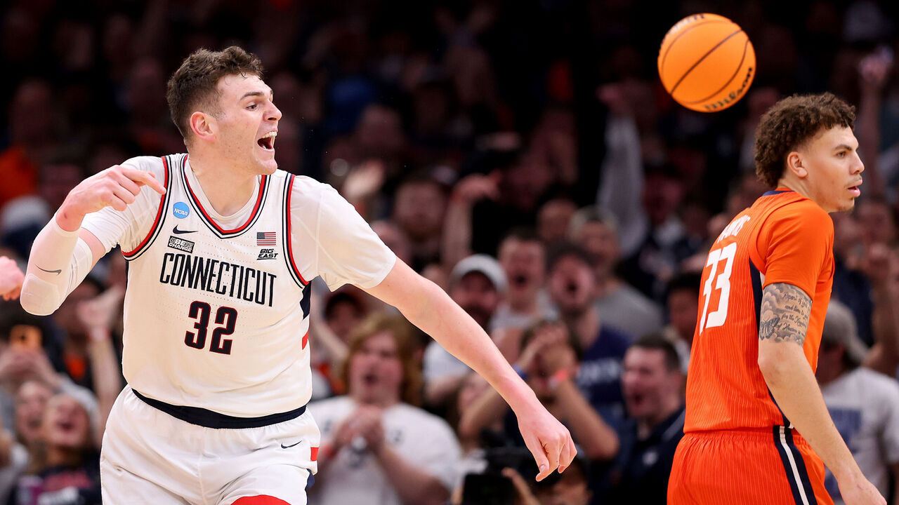 BOSTON, MASSACHUSETTS - MARCH 30: Donovan Clingan #32 of the Connecticut Huskies celebrates a basket against the Illinois Fighting Illini during the second half in the Elite 8 round of the NCAA Men's Basketball Tournament at TD Garden on March 30, 2024 in Boston, Massachusetts.