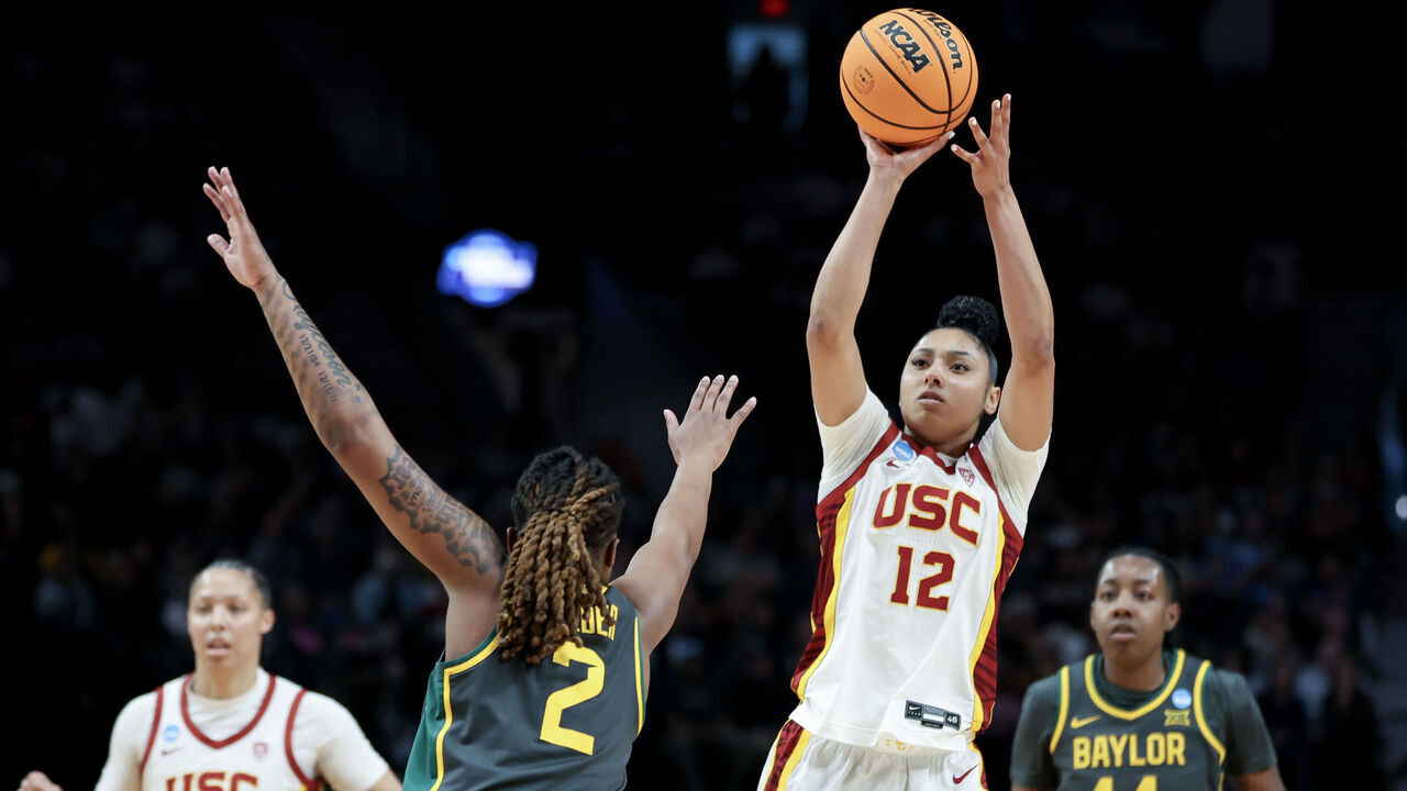 PORTLAND, OREGON - MARCH 30: JuJu Watkins #12 of the USC Trojans shoots over Yaya Felder #2 of the Baylor Lady Bears during the first half in the Sweet 16 round of the NCAA Women's Basketball Tournament at Moda Center on March 30, 2024 in Portland, Oregon.