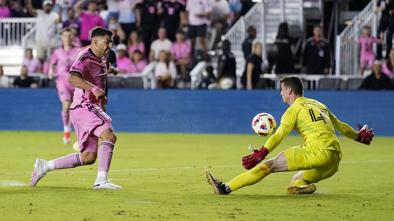 FORT LAUDERDALE, FLORIDA - MARCH 30: Luis Suárez #9 of Inter Miami CF takes a shot against Matt Freese #49 of New York City FC at DRV PNK Stadium on March 30, 2024 in Fort Lauderdale, Florida.
