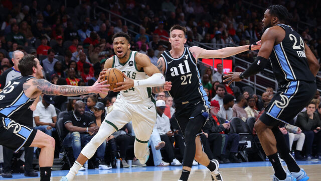 ATLANTA, GEORGIA - MARCH 30: Giannis Antetokounmpo #34 of the Milwaukee Bucks drives against Garrison Mathews #25, Vit Krejci #27 and Bruno Fernando #24 of the Atlanta Hawks during the first quarter at State Farm Arena on March 30, 2024 in Atlanta, Georgia. NOTE TO USER: User expressly acknowledges and agrees that, by downloading and/or using this photograph, user is consenting to the terms and conditions of the Getty Images License Agreement.