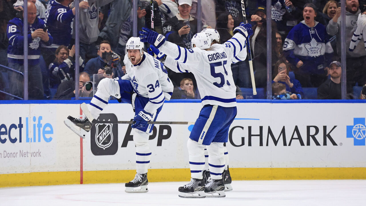 BUFFALO, NEW YORK - MARCH 30: Auston Matthews #34 of the Toronto Maple Leafs celebrates his 60th goal of the season during an NHL game against the Buffalo Sabres on March 30, 2024 at KeyBank Center in Buffalo, New York.