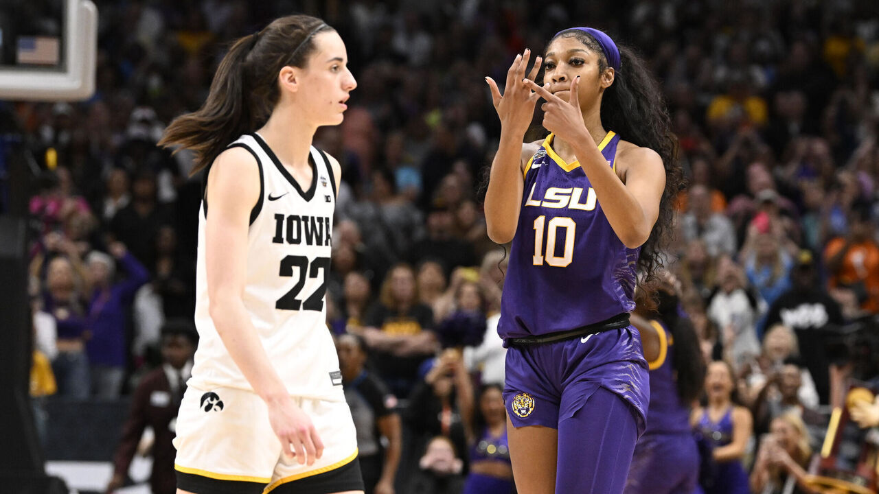 College Basketball: NCAA Finals: LSU Angel Reese (10) taunting Iowa Caitlin Clark (22) and pointing to her ring finger after winning championship game vs Iowa at American Airlines Arena Dallas, TX 4/2/2023 CREDIT: Greg Nelson (Set Number: X164332 TK2)