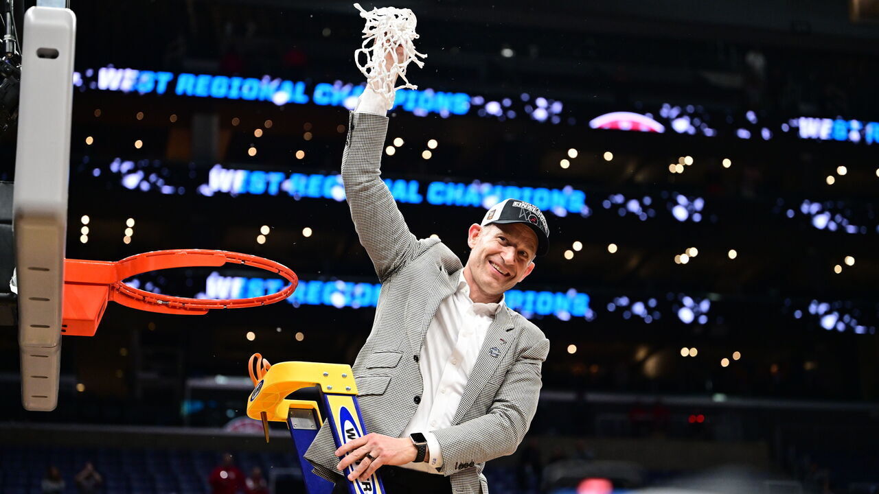 LOS ANGELES, CALIFORNIA - MARCH 30: Head coach Nate Oats of the Alabama Crimson Tide smiles after cutting down the net as West Regional champions after defeating the Clemson Tigers in the Elite Eight round of the 2024 NCAA Men's Basketball Tournament held at Crypto.com Arena on March 30, 2024 in Los Angeles, California.