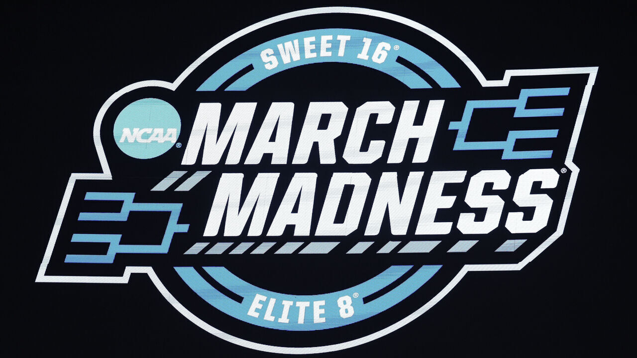 DALLAS, TEXAS - MARCH 29: A general view of the March Madness logo during a game between the Marquette Golden Eagles and the North Carolina State Wolfpack in the Sweet 16 round of the NCAA Men's Basketball Tournament at American Airlines Center on March 29, 2024 in Dallas, Texas.