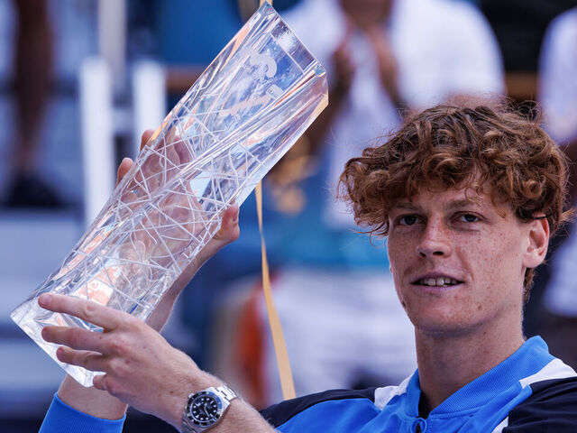 MIAMI GARDENS, FLORIDA - MARCH 31: Jannik Sinner of Italy poses with the Butch Buchholz trophy after beating Grigor Dimitrov of Bulgaria in the final of the Miami Open at the Hard Rock Stadium on March 31, 2024 in Miami Gardens, Florida.