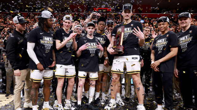 DETROIT, MICHIGAN - MARCH 31: Zach Edey #15 of the Purdue Boilermakers celebrates with his teammates after defeating the Tennessee Volunteers in the Elite 8 round of the NCAA Men's Basketball Tournament at Little Caesars Arena on March 31, 2024 in Detroit, Michigan.