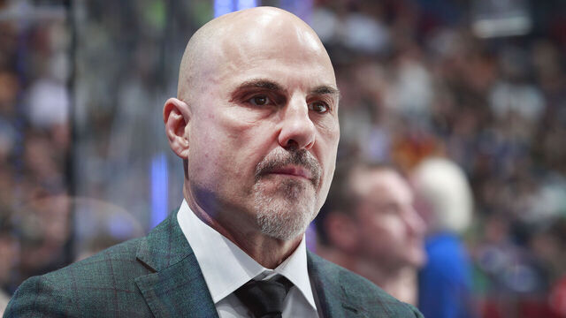 VANCOUVER, CANADA - MARCH 16: Head coach Rick Tocchet of the Vancouver Canucks looks on from the bench during their NHL game against the Washington Capitals at Rogers Arena on March 16, 2024 in Vancouver, British Columbia, Canada.