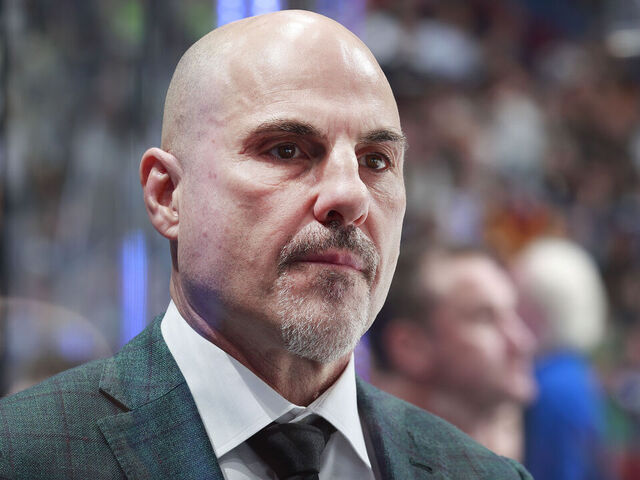 VANCOUVER, CANADA - MARCH 16: Head coach Rick Tocchet of the Vancouver Canucks looks on from the bench during their NHL game against the Washington Capitals at Rogers Arena on March 16, 2024 in Vancouver, British Columbia, Canada.