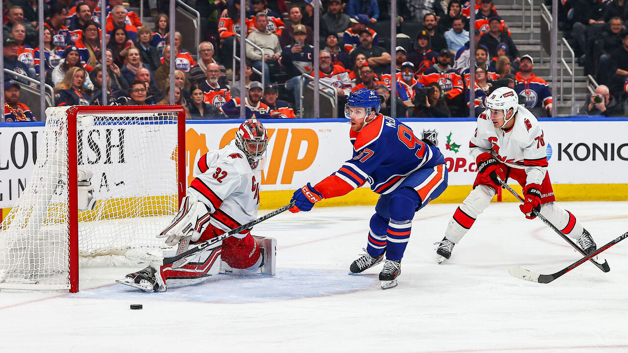 EDMONTON, AB - DECEMBER 6: Edmonton Oilers Center Connor McDavid (97) is stopped by Carolina Hurricanes Goalie Antti Raanta (32) in the third period of the Edmonton Oilers game versus the Carolina Hurricanes on December 6, 2023 at Rogers Place in Edmonton, AB.